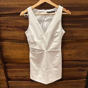 Elegant White Cut-out Cocktail Dress with Built-in Shorts